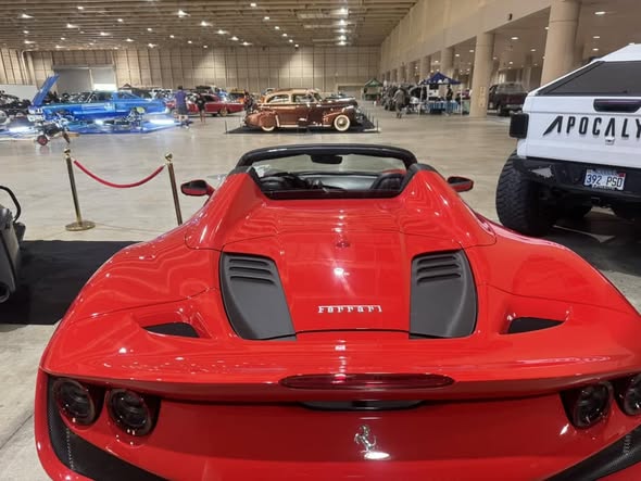 Red sports car with a polished gloss finish