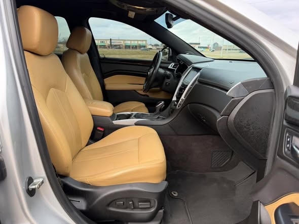 Clean tan leather front seat after detailing