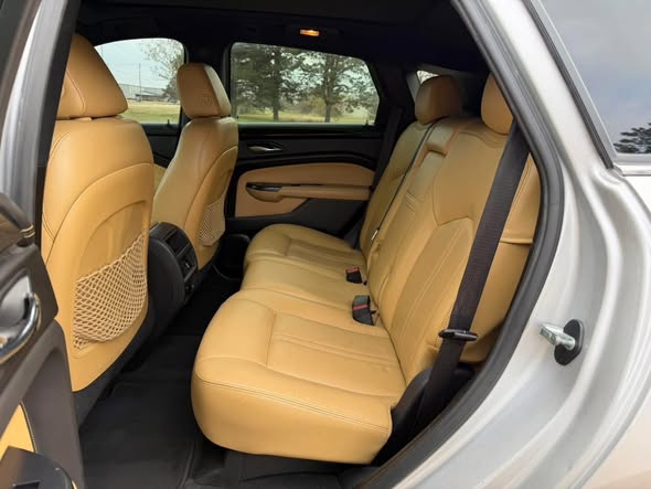 Clean tan leather rear seat