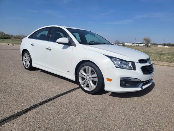 White sedan after exterior detailing